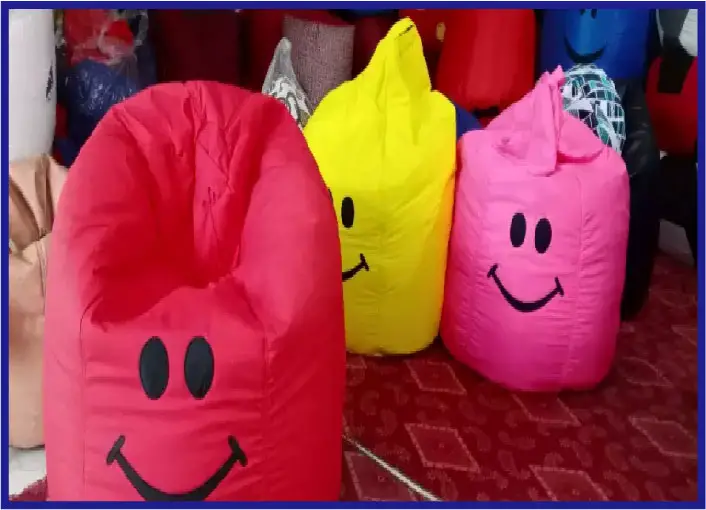 bean bags present in different colors on the floor